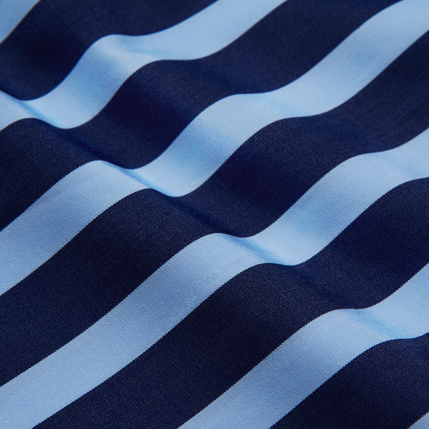 View 4 of product The Turnbull & Asser Navy Multi Stripe Cotton Weekend Fit Suffolk Shirt features vertical blue and navy stripes, a chest pocket, buttoned cuffs, and a classic buttoned Dorset collar.