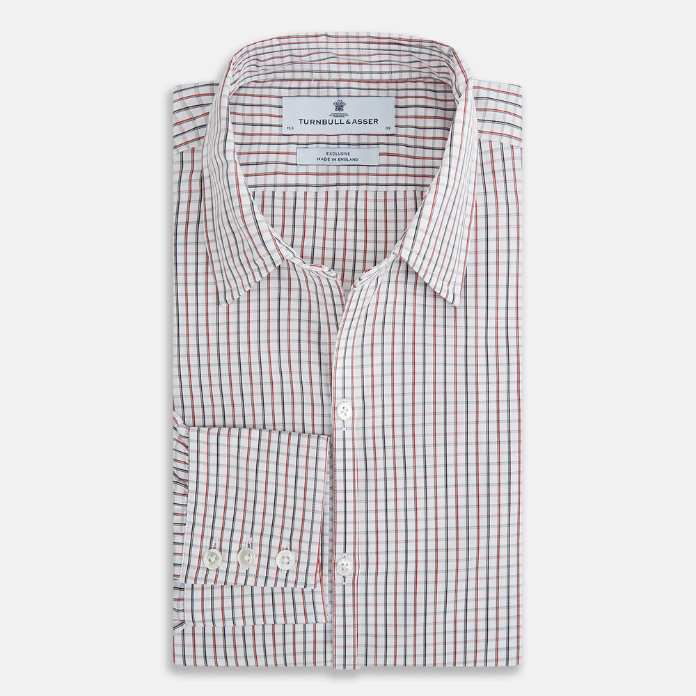 The Turnbull & Asser Red and Midnight Blue Tattersall Check Windsor Shirt features British craftsmanship, shown laid flat with sleeves extended and collar neatly folded.