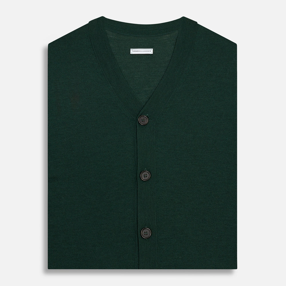 The Turnbull & Asser Forest Green Fine Merino V-Neck Sleeveless Cardigan features front buttons and two small pockets, shown against a white background.