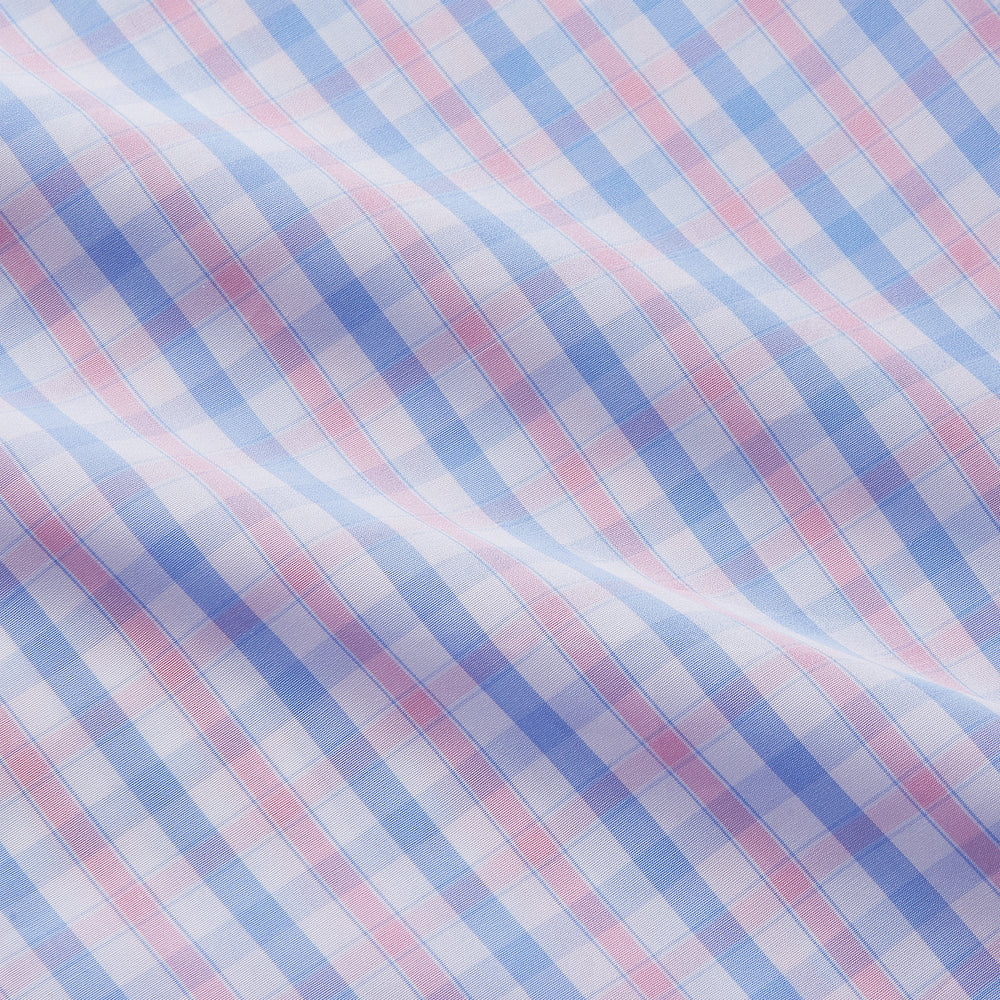 The Turnbull & Asser Red and Blue Multi Check Cotton RE-PURPOSE Mayfair shirt is a sustainable, long-sleeve button-up with a collar and cuffed sleeves, crafted from recycled fabrics and shown laid flat on a white background.