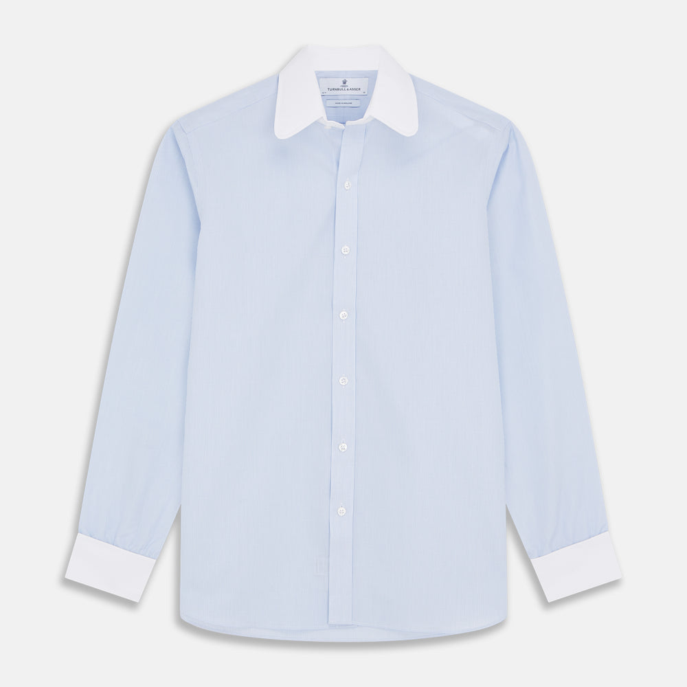 The Turnbull & Asser Micro Blue Check with White Collar and Cuff Shirt, a light blue long-sleeve style, features contrasting white collar and cuffs, buttoned down the front and laid flat on a white background.