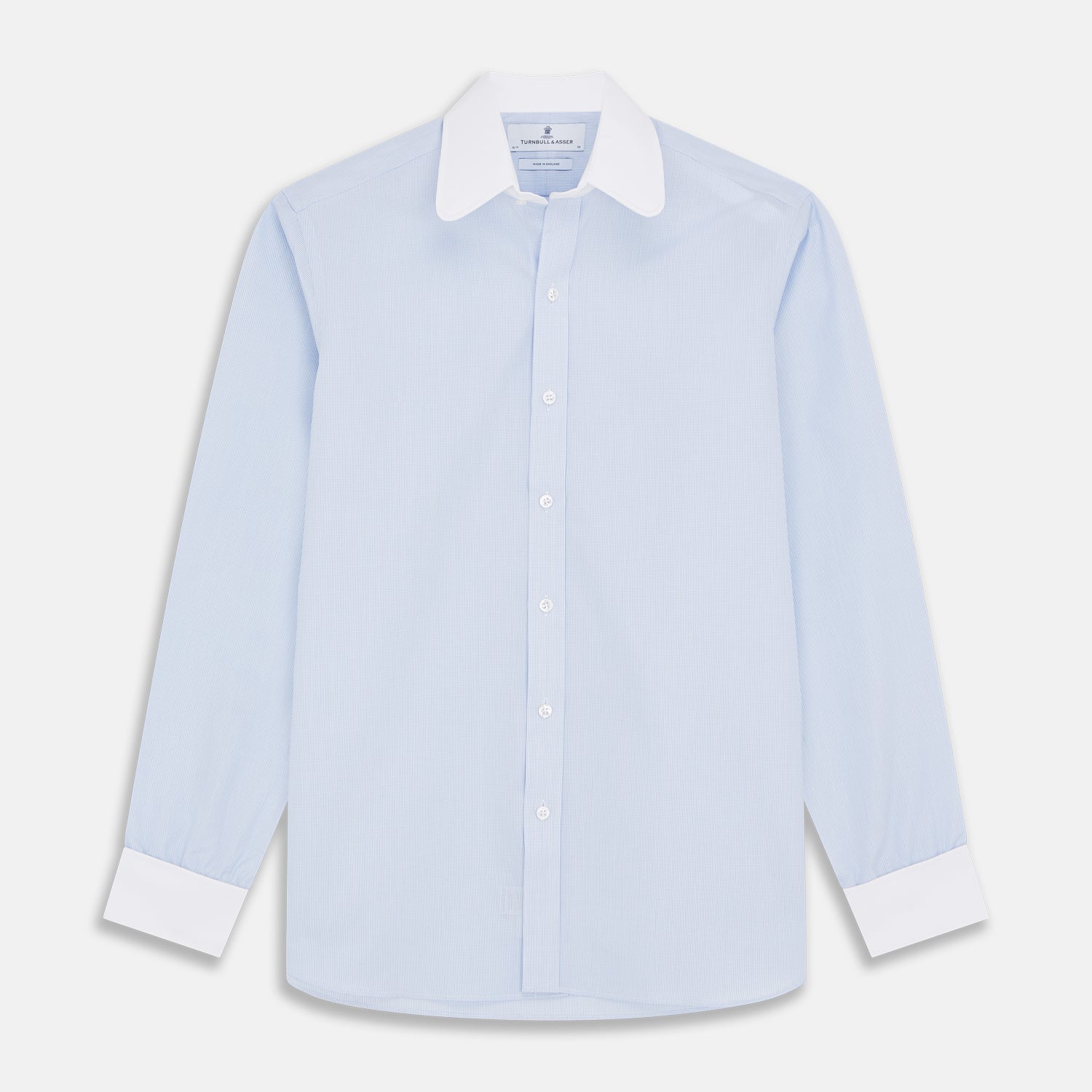 View 1 of product The Turnbull & Asser Micro Blue Check with White Collar and Cuff Shirt, a light blue long-sleeve style, features contrasting white collar and cuffs, buttoned down the front and laid flat on a white background.