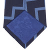 View 4 of product The Turnbull & Asser Navy and Light Blue Striped Zigzag Silk Tie features a striking zigzag pattern—a stylish accessory for the modern gentleman.