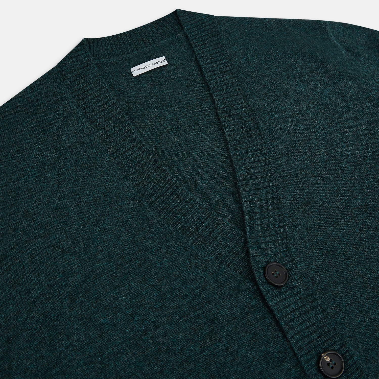 View 2 of product Turnbull & Asser’s Green Melange Cashmere Cardigan features a V-neck, long sleeves, ribbed cuffs and hem, two front pockets, and a button-up front—an essential knitwear piece shown against a white background.
