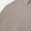 View 6 of product The Burgundy Halo Stripe Westminster Shirt by Turnbull & Asser features long sleeves, a button-up front, a Westminster collar, and thin vertical brown and white stripes, shown on a plain white background.