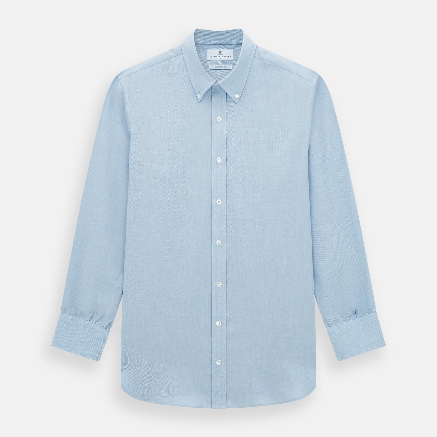 View 1 of product The Turnbull & Asser Pale Blue Cotton Cashmere Dorset Collar Richmond Shirt features long sleeves, a button-down collar, white buttons, and a chest pocket. It is neatly displayed flat on a white background.