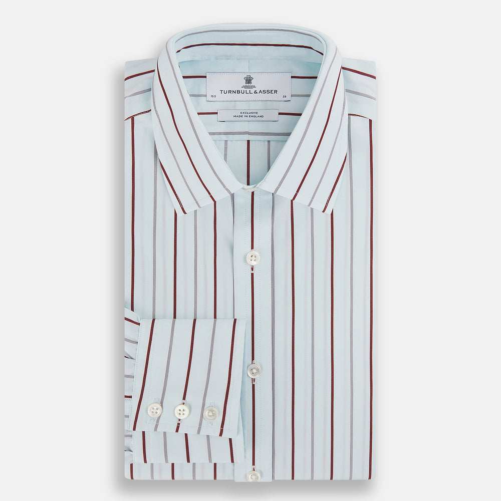 The Turnbull & Asser Burgundy Combination Stripe Mayfair Shirt features long sleeves, a classic T&A collar, and vertical black and burgundy stripes on white, laid flat against a plain white background.