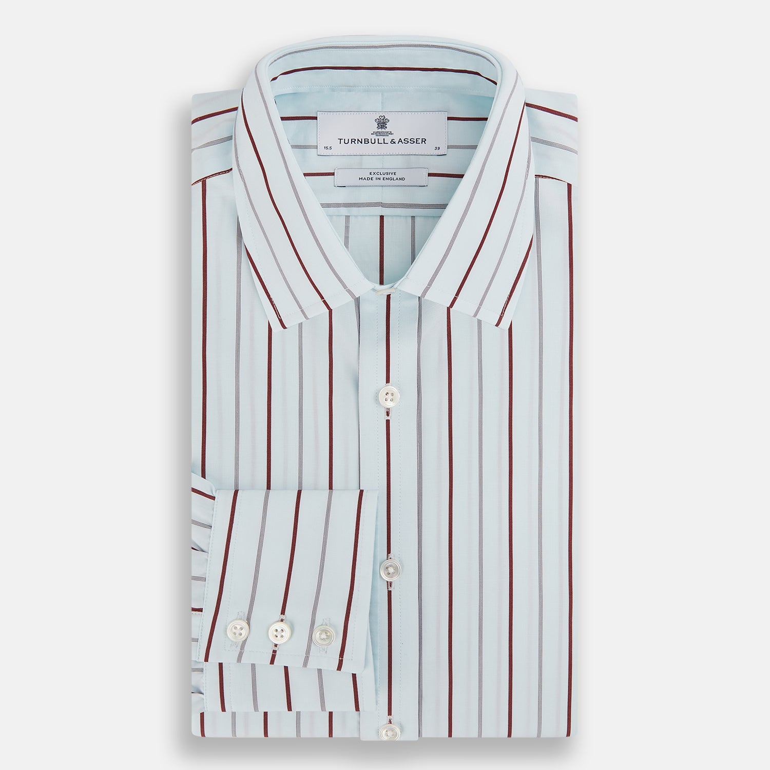 View 5 of product The Turnbull & Asser Burgundy Combination Stripe Mayfair Shirt features long sleeves, a classic T&A collar, and vertical black and burgundy stripes on white, laid flat against a plain white background.