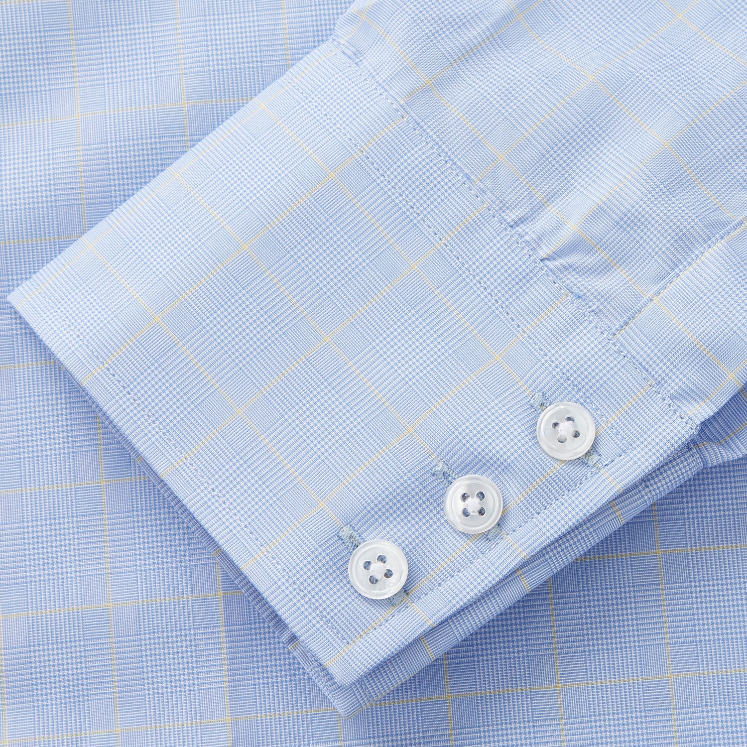 View 3 of product A Turnbull & Asser Yellow and Blue Prince of Wales Check Mayfair Shirt with white buttons and a classic collar, laid flat on a white background.