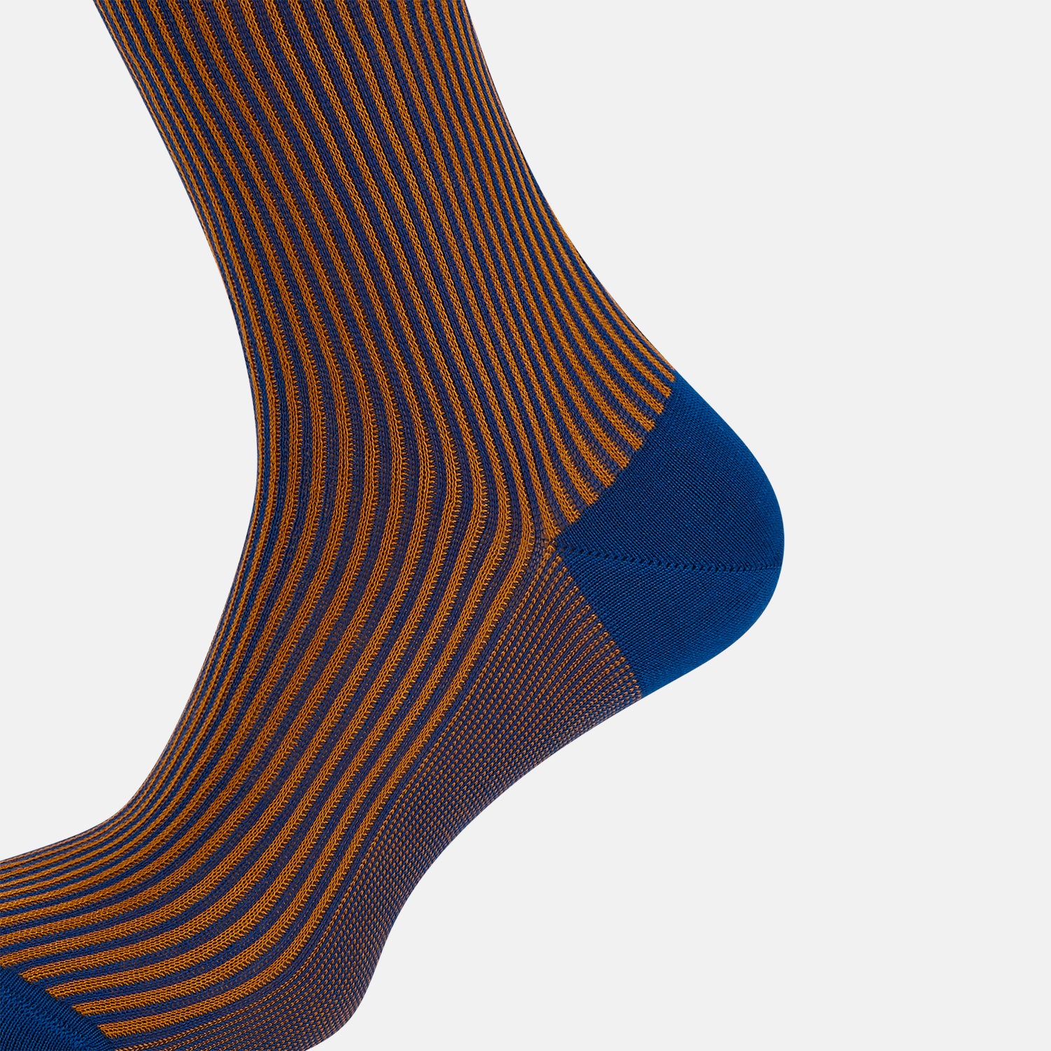 View 4 of product The Turnbull & Asser Royal Blue/Orange Thin Striped Long Sock is a knee-high, over-the-calf sock in mercerised Egyptian cotton, featuring vertical orange and dark blue stripes with blue cuff, heel, and toe. Displayed on a white background.