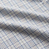 View 4 of product The Turnbull & Asser Blue Multi Check Regular Fit Cotton-Cashmere Shirt features a T&A collar, 3 button cuffs, and a white background with tonal blue and light brown checks—shown flat against a white background.