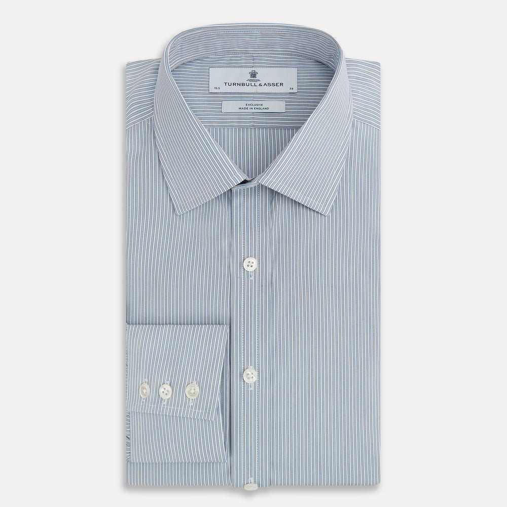 The Blue and Brown Ticking Stripe Mayfair Shirt by Turnbull & Asser, crafted from premium Italian cotton with a collar, white buttons, and buttoned cuffs, is an essential addition to any gentleman's wardrobe.