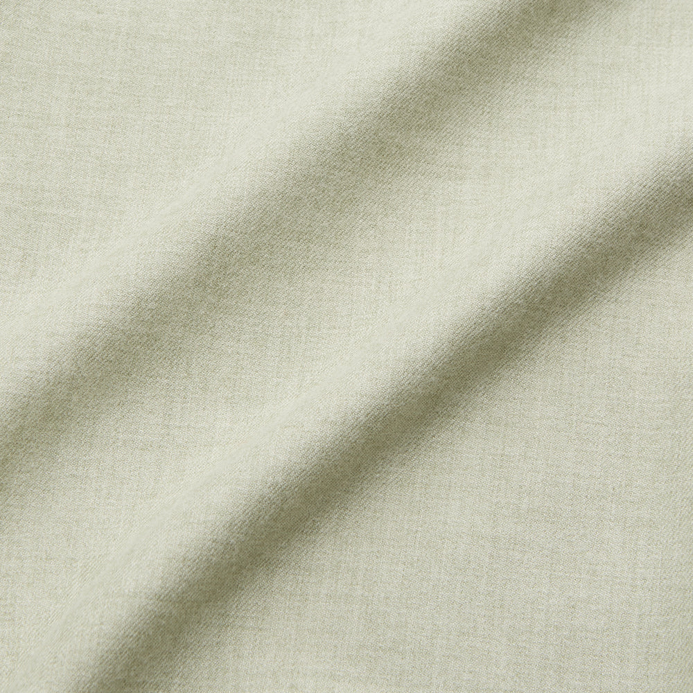 The Turnbull & Asser Soft Green Cashmerello Weekend Fit Finch Shirt features a Derby collar, long sleeves, chest pocket, white buttons, and cuffs. Laid flat on a white background.