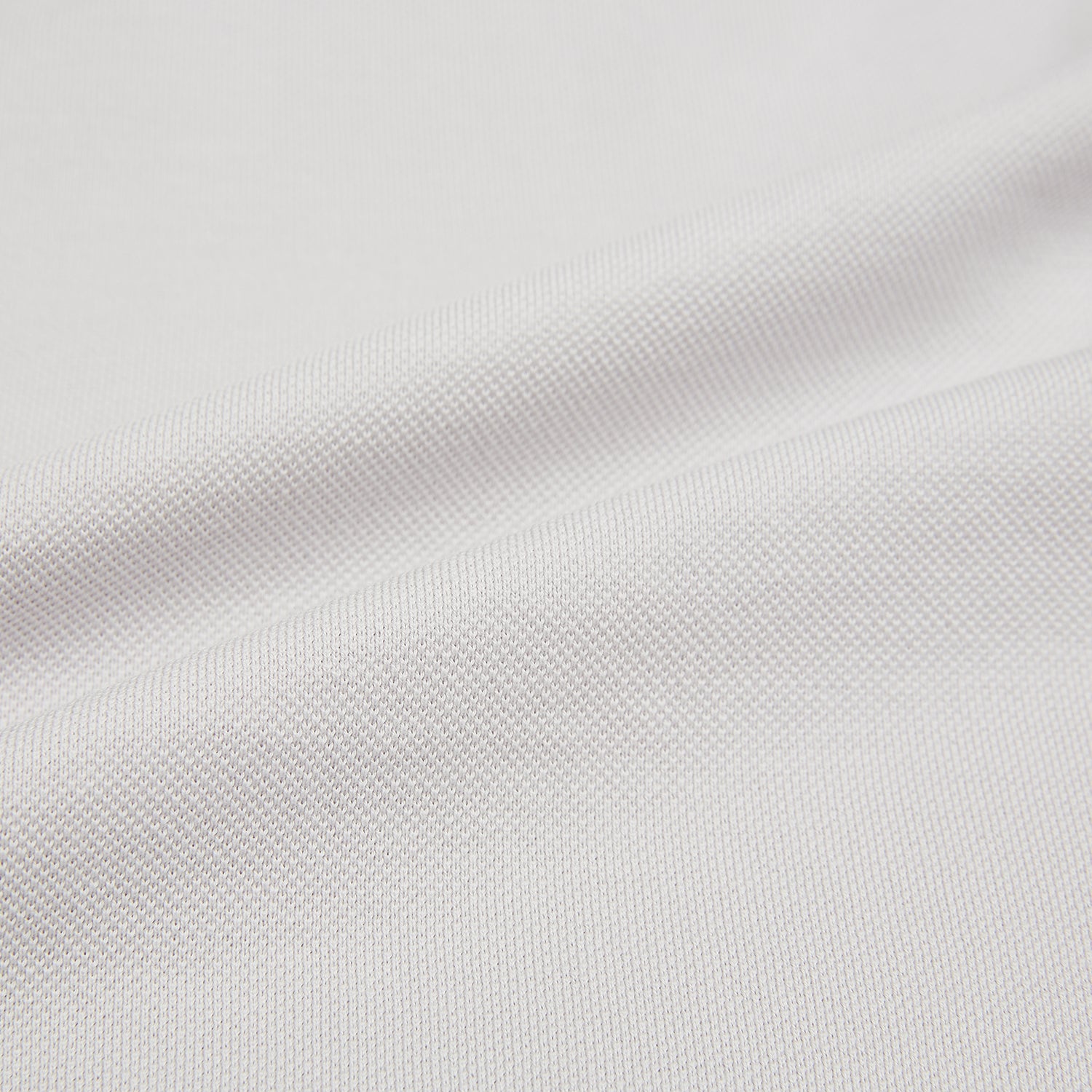 View 6 of product A pale pink luxury cotton rugby polo shirt by Turnbull & Asser, featuring long sleeves and a collar with no buttons, displayed flat on a white background.