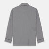 View 6 of product The Turnbull & Asser Black Candy Stripe Cotton Hyde Pyjama Set for men features soft cotton striped pajamas with a long-sleeve, button-up shirt detailed with black piping and three pockets, plus matching pants, both laid flat on a white background.