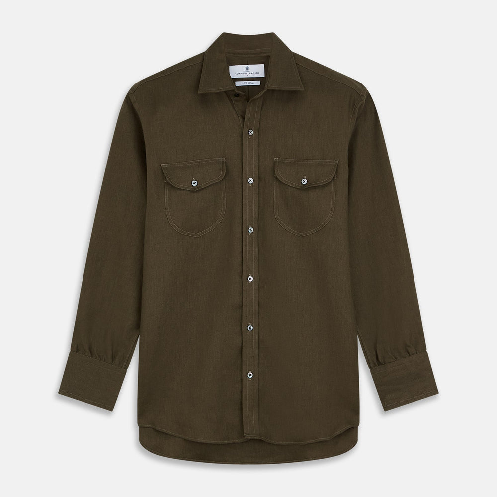 Close-up of Turnbull & Asser's Khaki Green Plain Linen Fabric, featuring a subtle diagonal ribbed texture, shown within a circular frame on a light gray background.