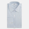 View 5 of product The Turnbull & Asser Blue Graph Check Mayfair Shirt features a classic T&A collar, Mayfair fit, buttoned cuffs, and long sleeves with light blue graph checks on a white background.