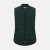 View 1 of product Turnbull & Asser Forest Green Quilted Gilet features a front zipper, two zippered side pockets, and a small chest pocket. Shown against a white background, it's a stylish lightweight layer for any season.