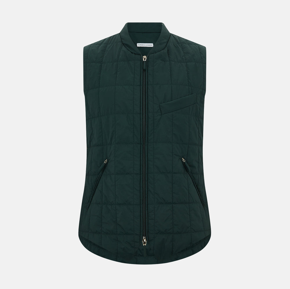 Turnbull & Asser Forest Green Quilted Gilet features a front zipper, two zippered side pockets, and a small chest pocket. Shown against a white background, it's a stylish lightweight layer for any season.
