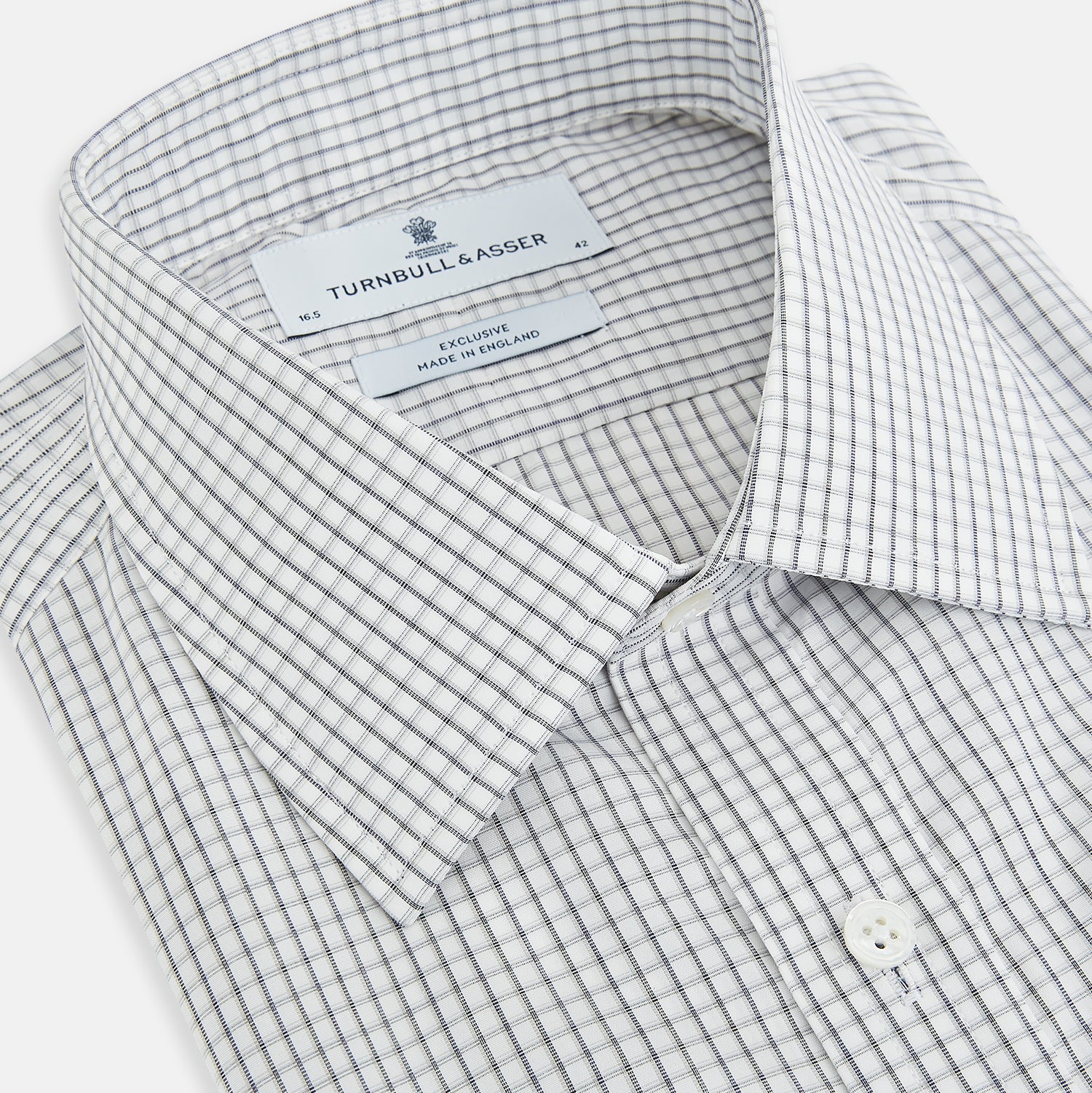 View 2 of product The Midnight Blue Multi Check Mayfair Shirt by Turnbull & Asser is a pure cotton, long-sleeve button-down featuring a small blue multi-check pattern, pointed collar, and buttoned cuffs.