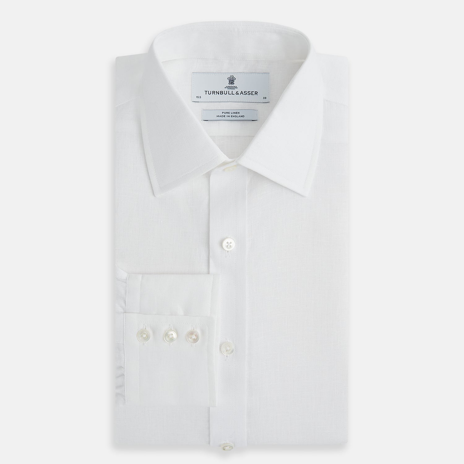 View 5 of product The Turnbull & Asser White Linen Mayfair Shirt features long sleeves and a classic collar, shown on a flat white background.