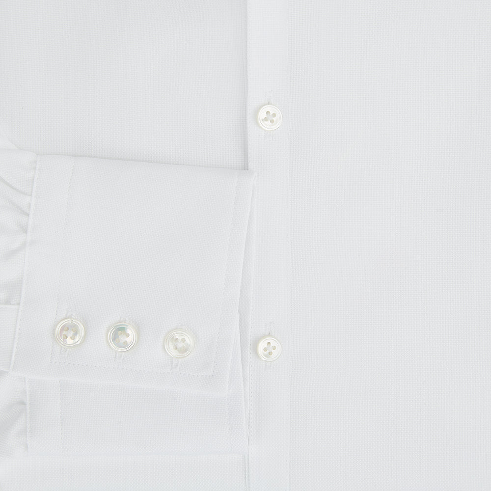 The Turnbull & Asser White Royal Oxford Cotton Windsor Shirt features a Turnbull open collar, long sleeves, 3-button cuffs, and a straight hem, shown against a plain white background.