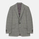 The Turnbull & Asser Beige Wool Prince-of-Wales Check Jacket is a single-breasted blazer with a notched lapel, one-button closure, two front flap pockets, and sleeve button details—an ideal lightweight summer jacket.