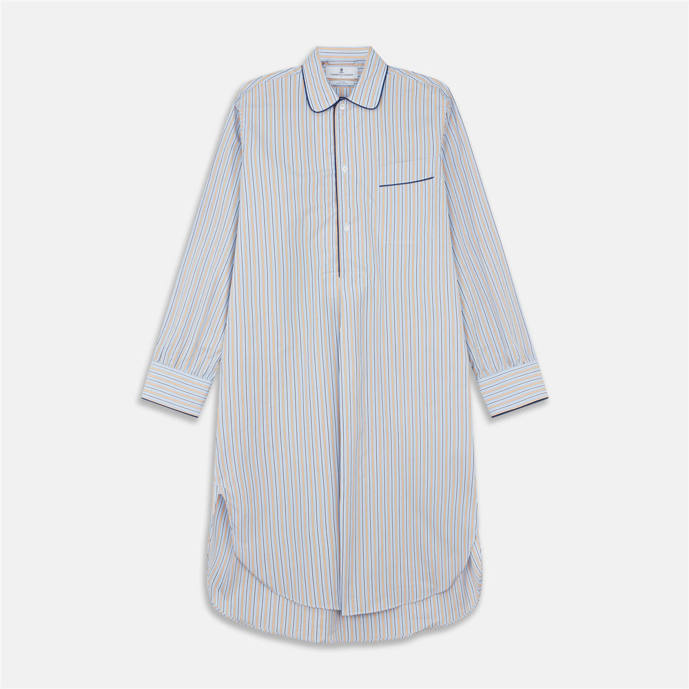 The Turnbull & Asser Blue, Orange and Navy Stripe Nightshirt is a loose-fitting shirt dress with vertical stripes, a pointed collar, chest pocket with blue trim, button-down front, long sleeves with cuffs, and a curved hem.