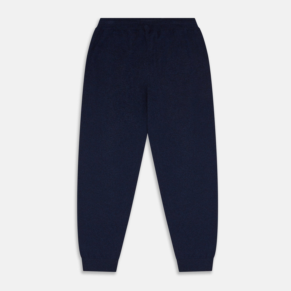 The Navy Cashmere Knitted Lounge Pyjama Trousers by Turnbull & Asser feature a contemporary fit, elastic waistband with drawstring, side pockets, and fitted cuffs, shown laid flat on a white background.