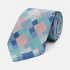 View 1 of product The Green Multi Pixel Silk Tie by Turnbull & Asser features a checked pattern in blue, teal, and pink on a light background, with diagonal stripes in each square for added texture.