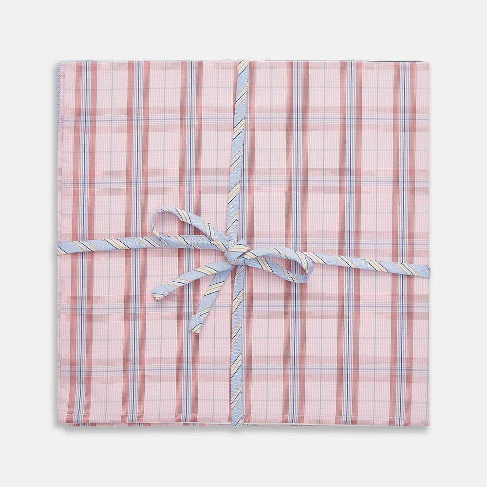A set of three Turnbull & Asser Red and Blue Cotton RE-PURPOSE Handkerchiefs, neatly folded and tied with a blue and white striped ribbon, displayed against a white background.
