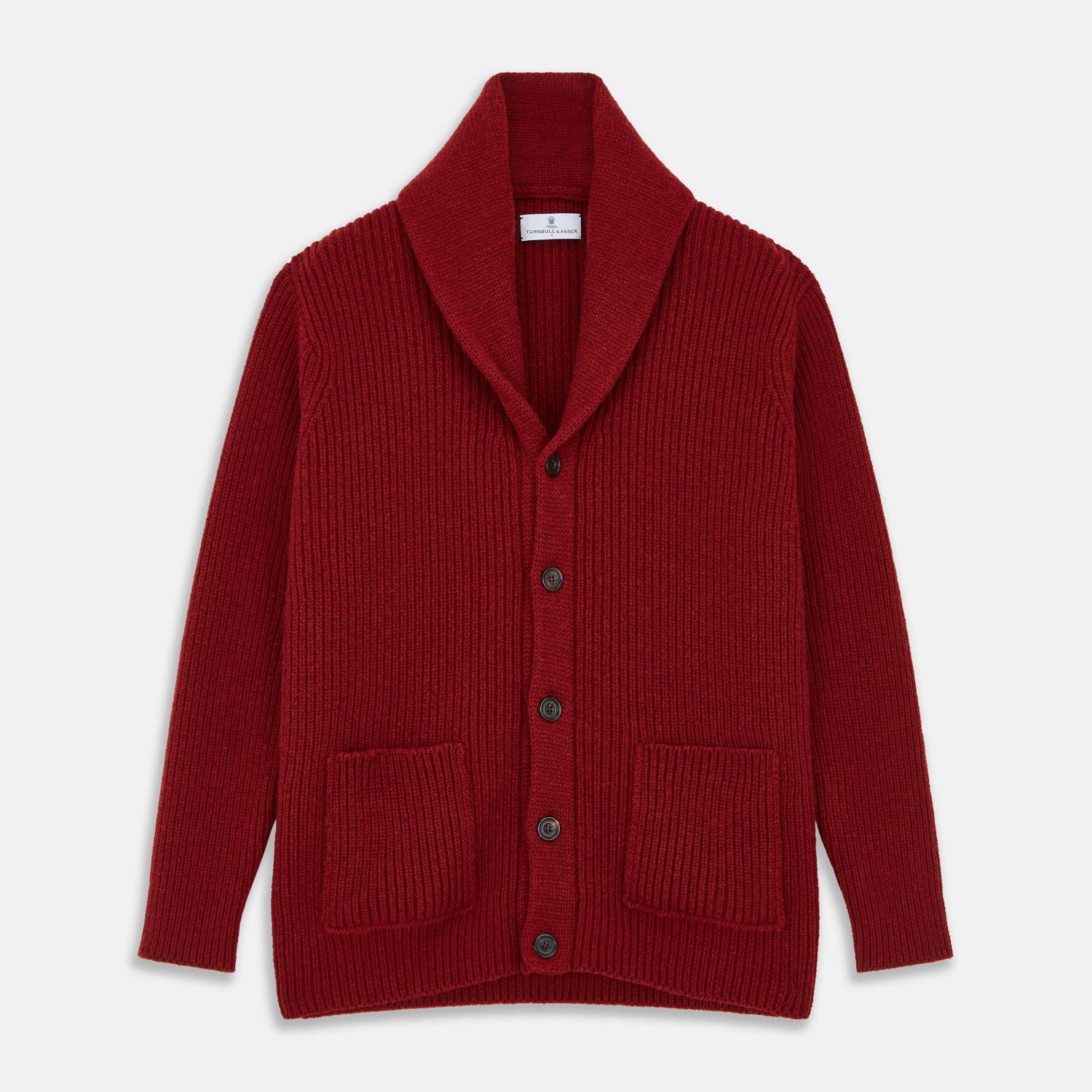 View 1 of product The Turnbull & Asser Burgundy Cashmere Ribbed Shawl Neck Ainsley Cardigan, featuring a button closure and two front pockets, is displayed flat on a white background.
