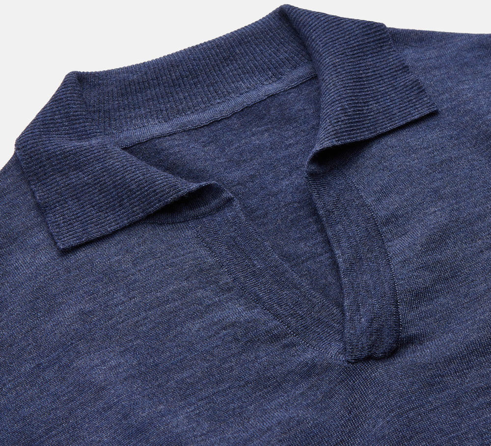 Turnbull & Asser Blue Merino Wool Roland Polo Shirt with short sleeves and an open collar, shown flat on a white background.