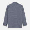 View 6 of product The Navy Motif Silk-Blend Hyde Pyjama Set by Turnbull & Asser features a blue and white pattern, long-sleeve button-up top with collar and front pocket, and matching pants, all displayed against a white background.