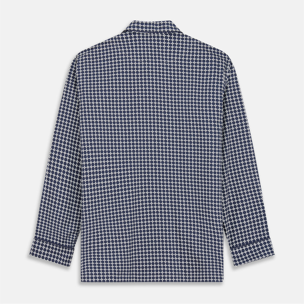 The Navy Motif Silk-Blend Hyde Pyjama Set by Turnbull & Asser features a blue and white pattern, long-sleeve button-up top with collar and front pocket, and matching pants, all displayed against a white background.