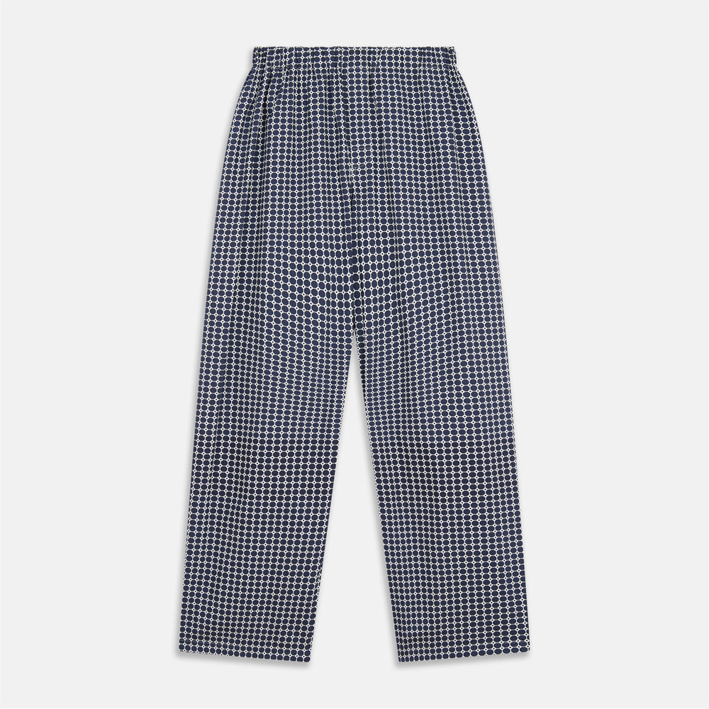 The Navy Motif Silk-Blend Hyde Pyjama Set by Turnbull & Asser features a blue and white pattern, long-sleeve button-up top with collar and front pocket, and matching pants, all displayed against a white background.