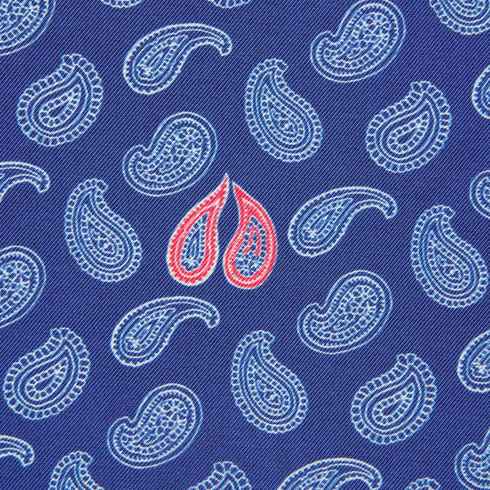 View 3 of product The Navy Multi Valentines Day Special Silk Pocket Square from Turnbull & Asser features a blue base with white and pink paisley motifs, a decorative border, and a discreet logo—an elegant gift for Valentine’s Day.