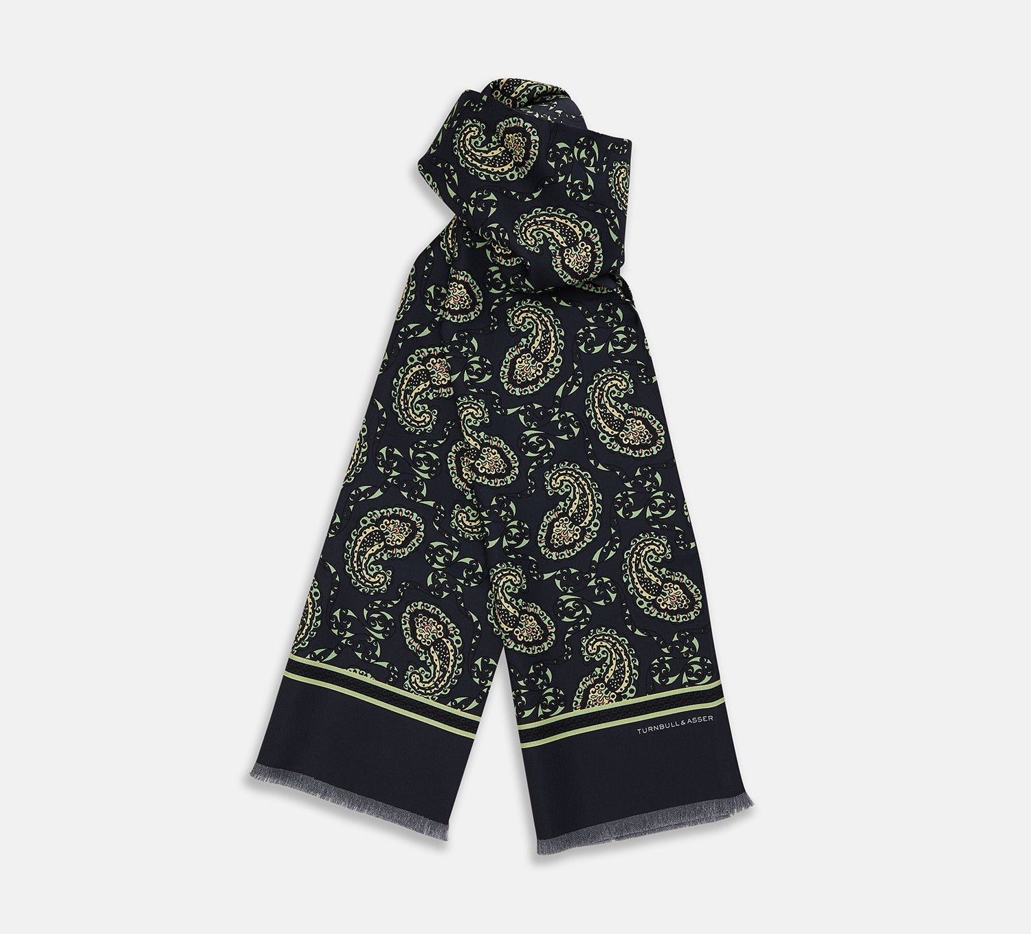 View 1 of product The Navy Paisley Silk Lawton Scarf by Turnbull & Asser features light green and cream paisley, a thin green stripe near the ends, short fringes on the edge, and is expertly crafted at a renowned UK silk mill.