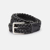 View 1 of product The Turnbull & Asser Black Leather Woven Belt, hand-woven with a shiny silver buckle, is shown rolled up on a plain white background.