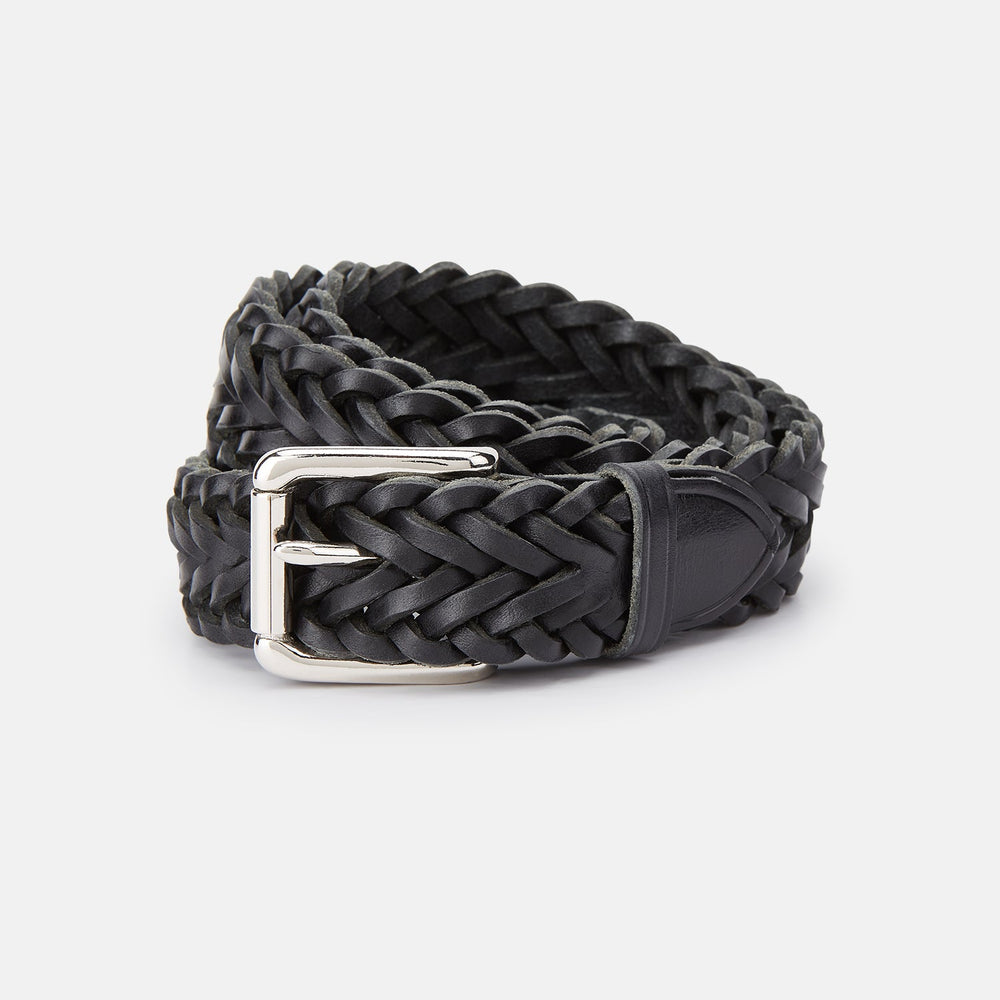 The Turnbull & Asser Black Leather Woven Belt, hand-woven with a shiny silver buckle, is shown rolled up on a plain white background.