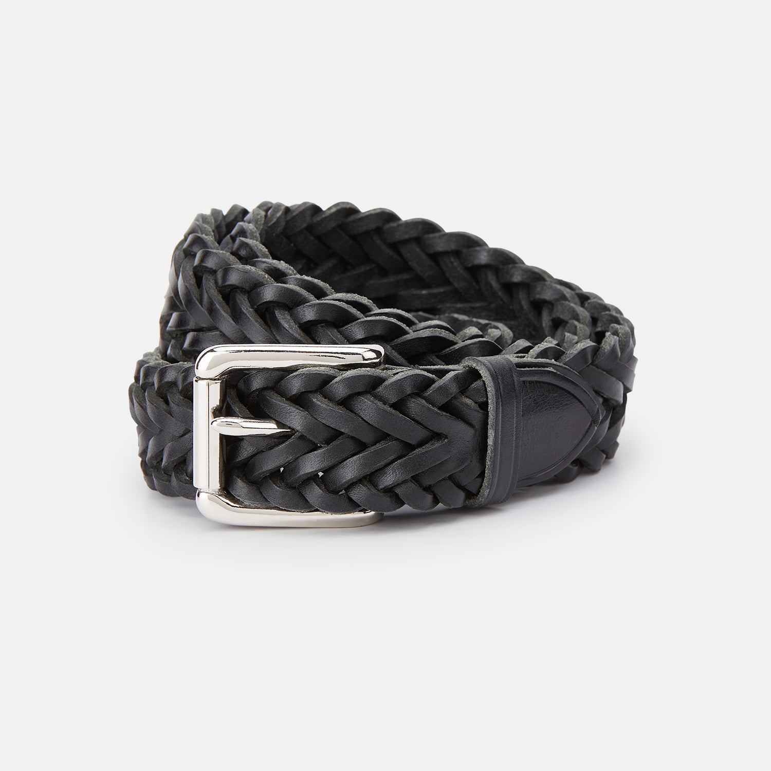 View 1 of product The Turnbull & Asser Black Leather Woven Belt, hand-woven with a shiny silver buckle, is shown rolled up on a plain white background.