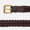 View 2 of product The Turnbull & Asser Brown Leather Woven Belt features a chocolate brown braided design and a brass roller buckle, displayed on a plain white background.