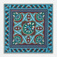 The Aqua and Burgundy Baroque Silk Pocket Square by Turnbull & Asser is crafted in England, featuring an intricate symmetrical pattern in teal, blue, red, and cream with ornate motifs framed by decorative borders.