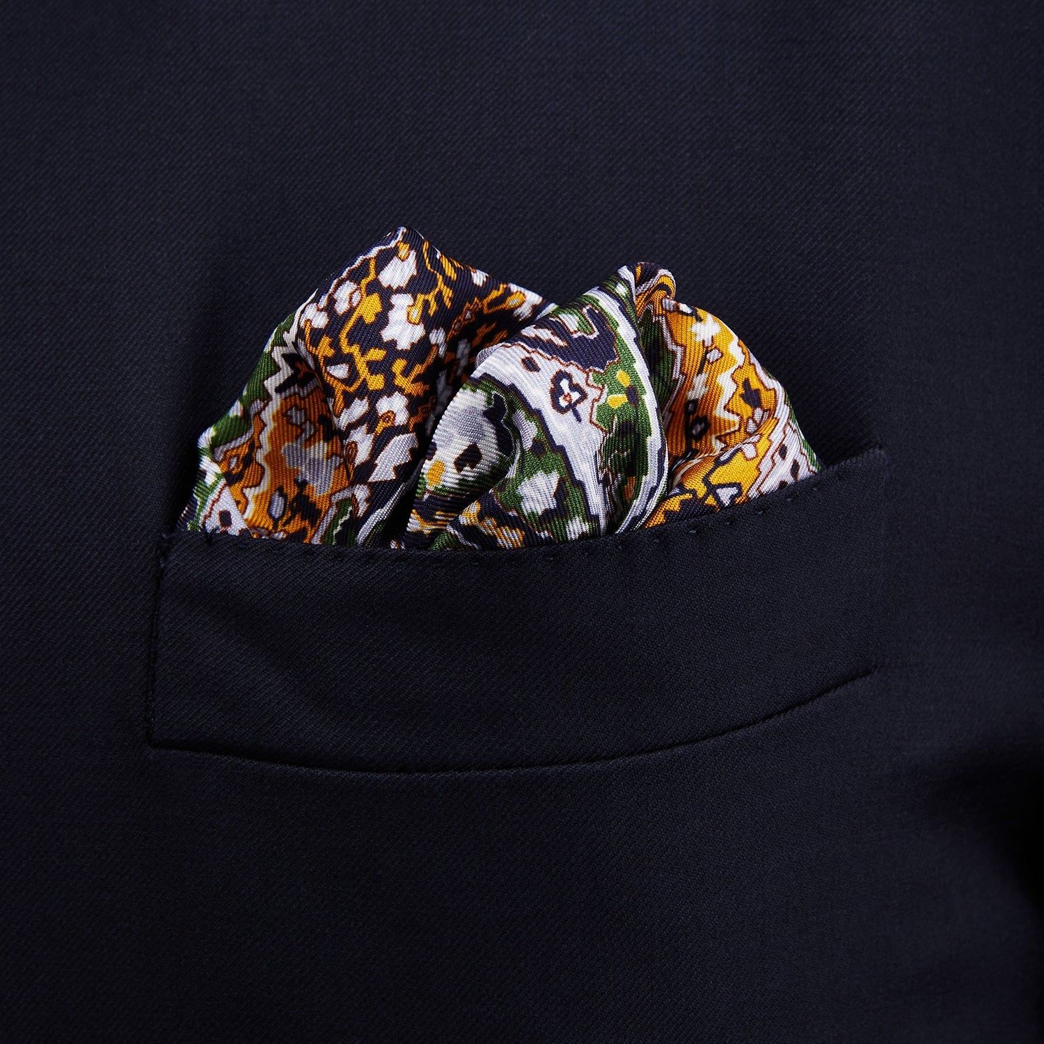 View 3 of product The Turnbull & Asser Lavender and Green Abstract Paisley Silk Pocket Square features a refined paisley design and is made in England.