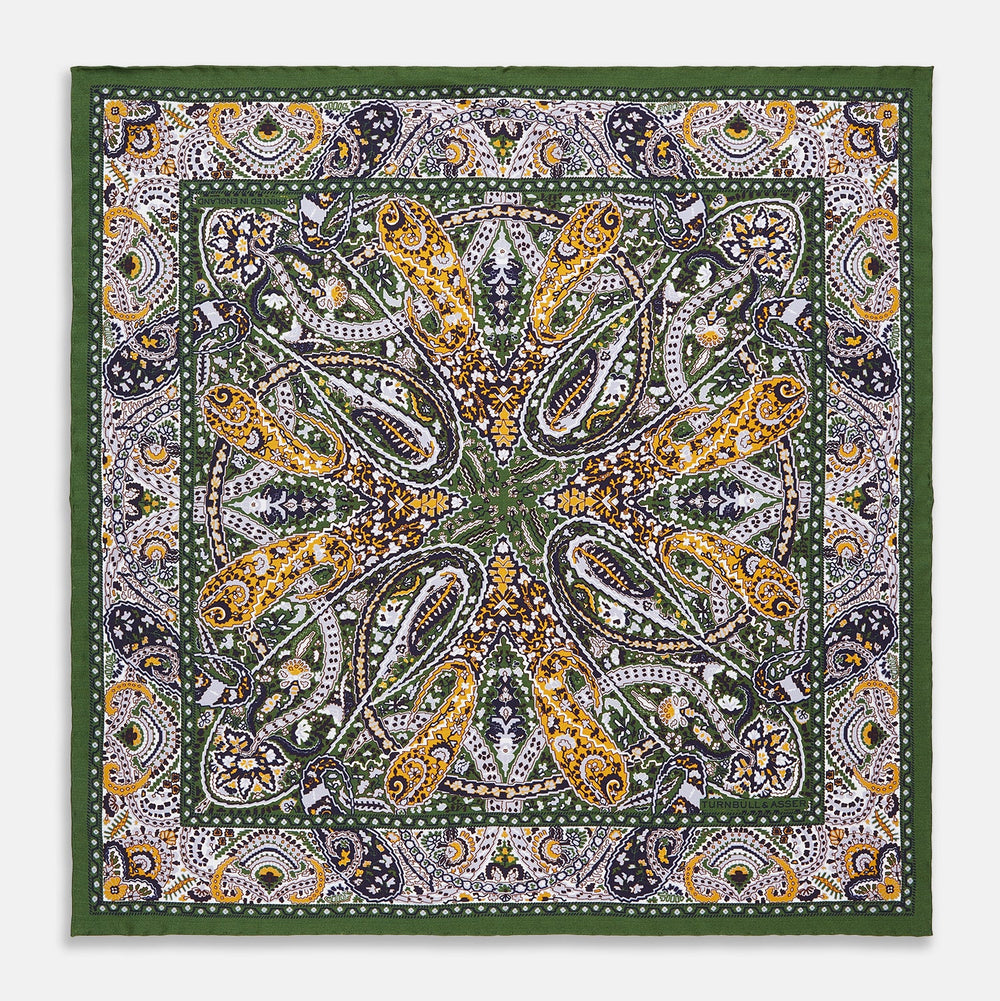 The Turnbull & Asser Lavender and Green Abstract Paisley Silk Pocket Square features a refined paisley design and is made in England.