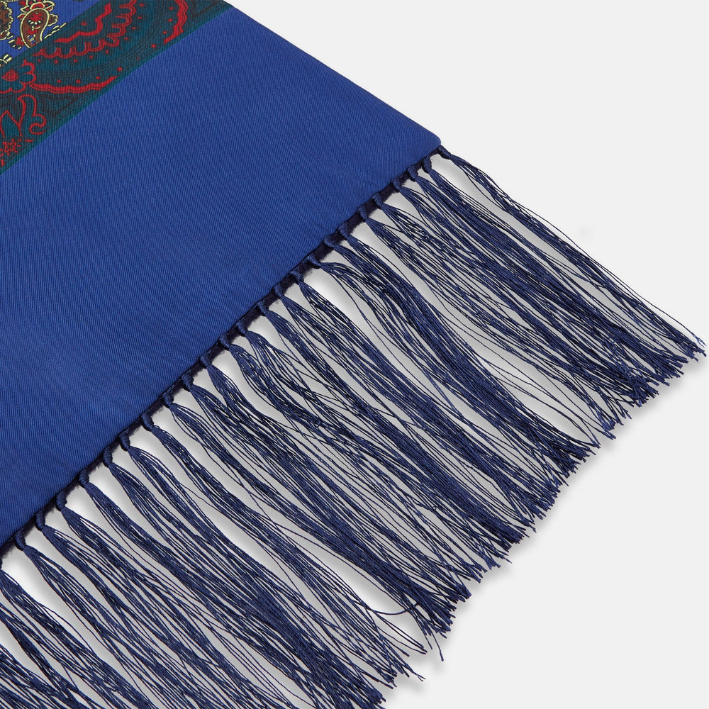 A sophisticated accessory, the Turnbull & Asser Burgundy and Ivy Paisley Silk Scarf features an intricate paisley pattern and solid ends with blue fringed tassels, displayed against a white background.