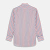 View 5 of product The Turnbull & Asser Red and Blue Stripe Cotton Regular Fit Whitby Shirt is a long-sleeve button-up featuring vibrant red and blue stripes on white, with a collar and buttoned cuffs, shown on a plain white surface.