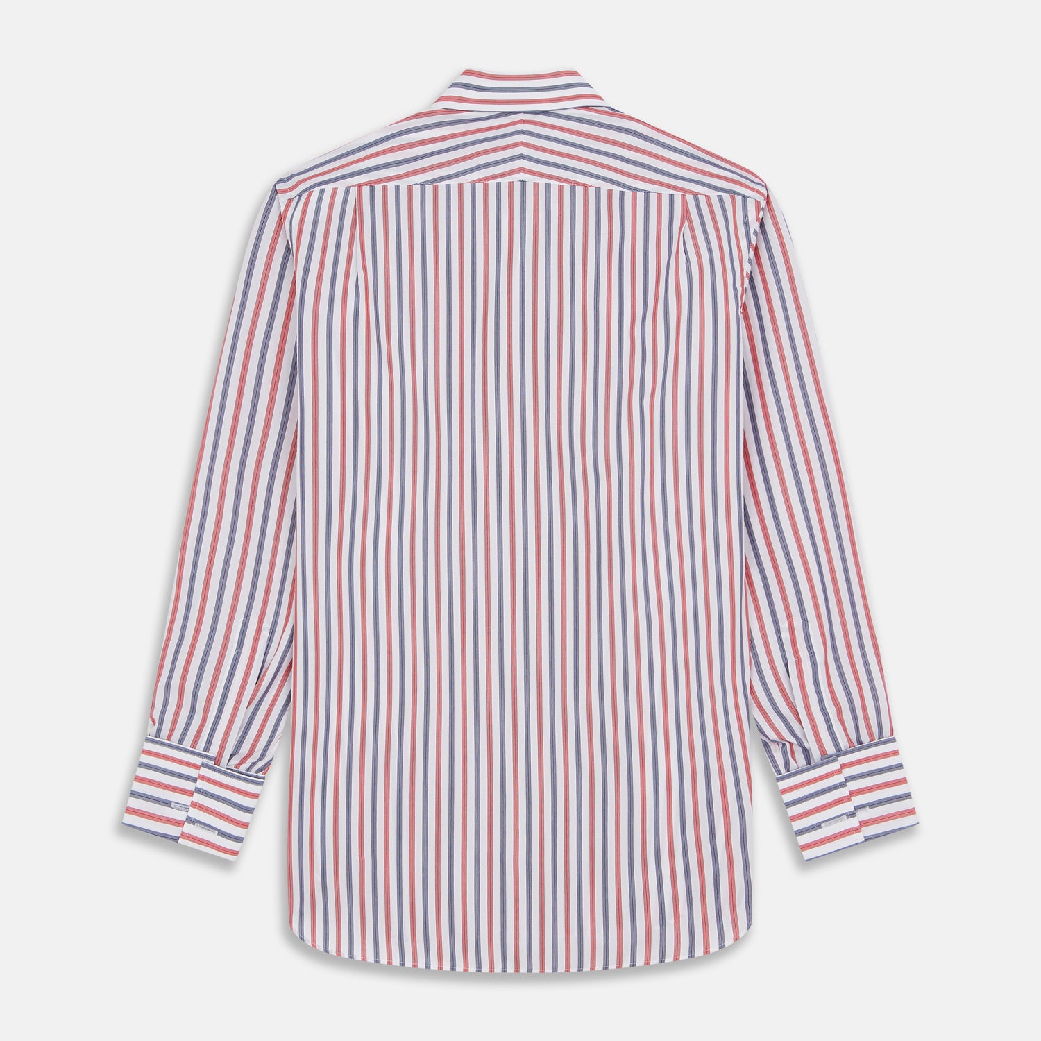 View 5 of product The Turnbull & Asser Red and Blue Stripe Cotton Regular Fit Whitby Shirt is a long-sleeve button-up featuring vibrant red and blue stripes on white, with a collar and buttoned cuffs, shown on a plain white surface.
