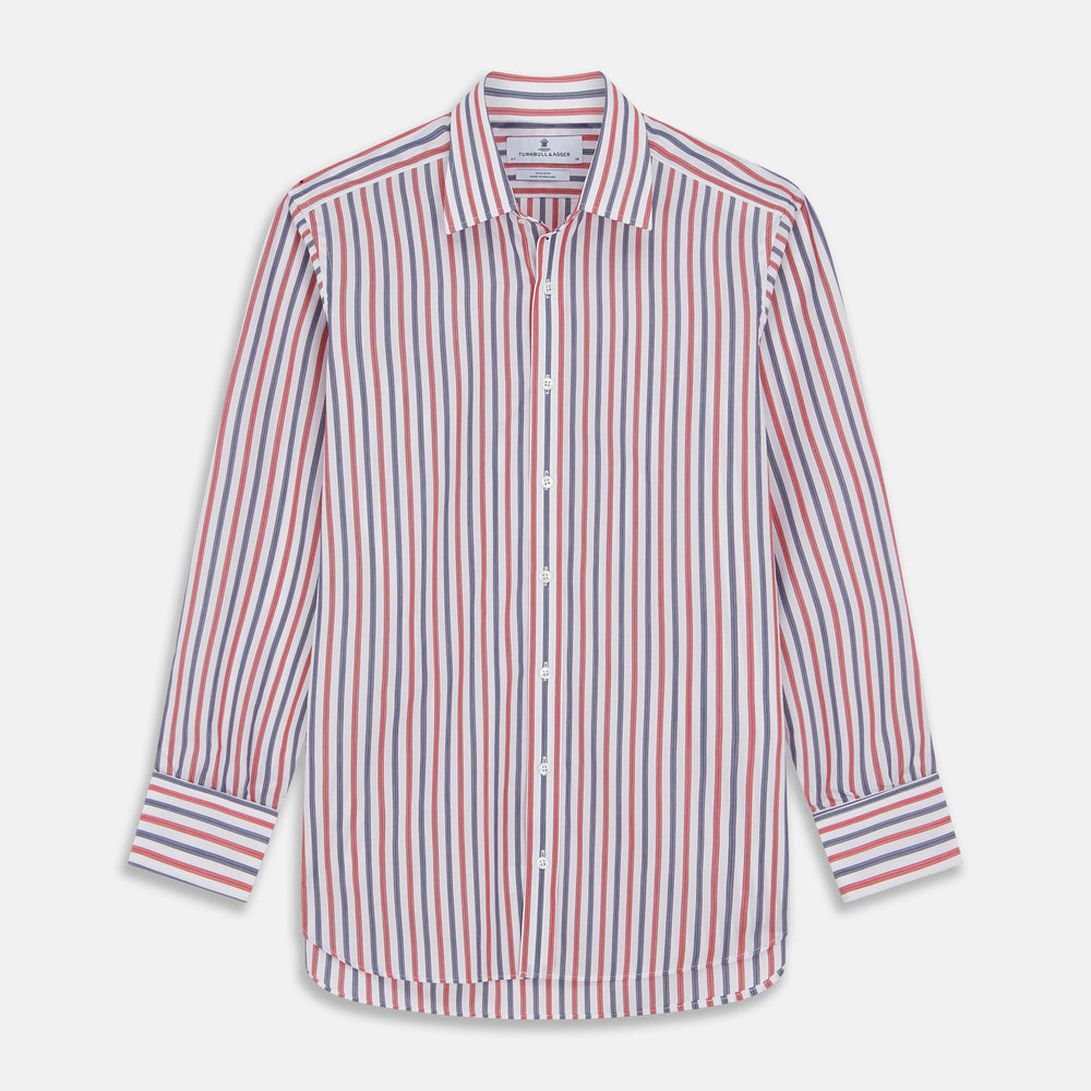 The Turnbull & Asser Red and Blue Stripe Cotton Regular Fit Whitby Shirt is a long-sleeve button-up featuring vibrant red and blue stripes on white, with a collar and buttoned cuffs, shown on a plain white surface.