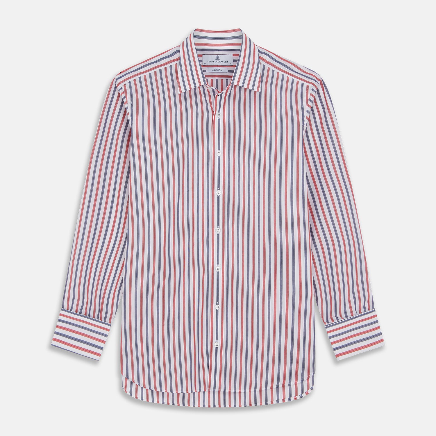 View 1 of product The Turnbull & Asser Red and Blue Stripe Cotton Regular Fit Whitby Shirt is a long-sleeve button-up featuring vibrant red and blue stripes on white, with a collar and buttoned cuffs, shown on a plain white surface.